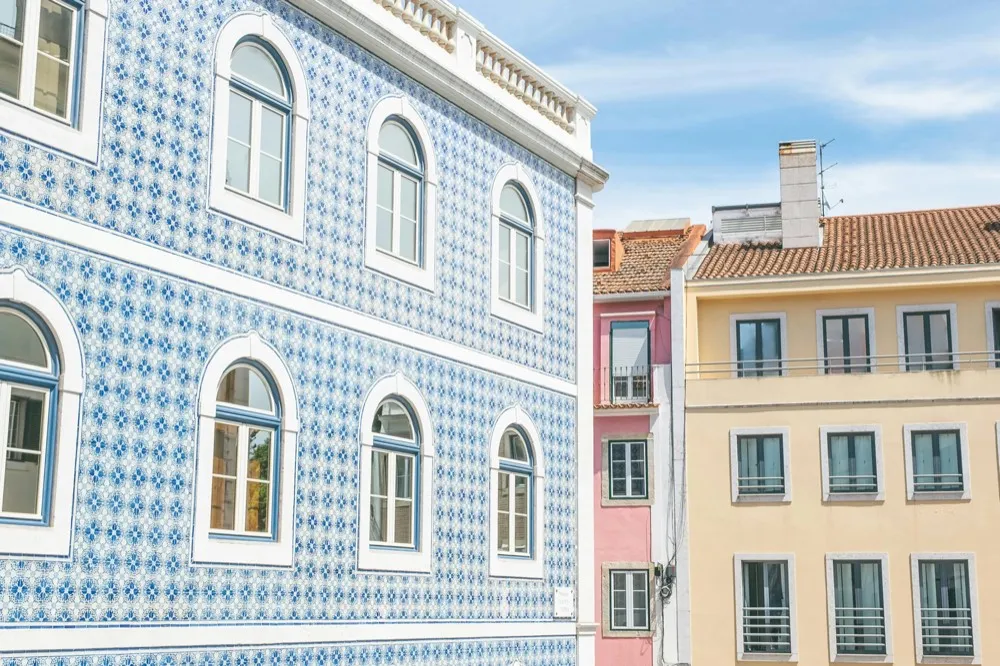 New image — bright Portuguese buildings with azulejo tiled facades